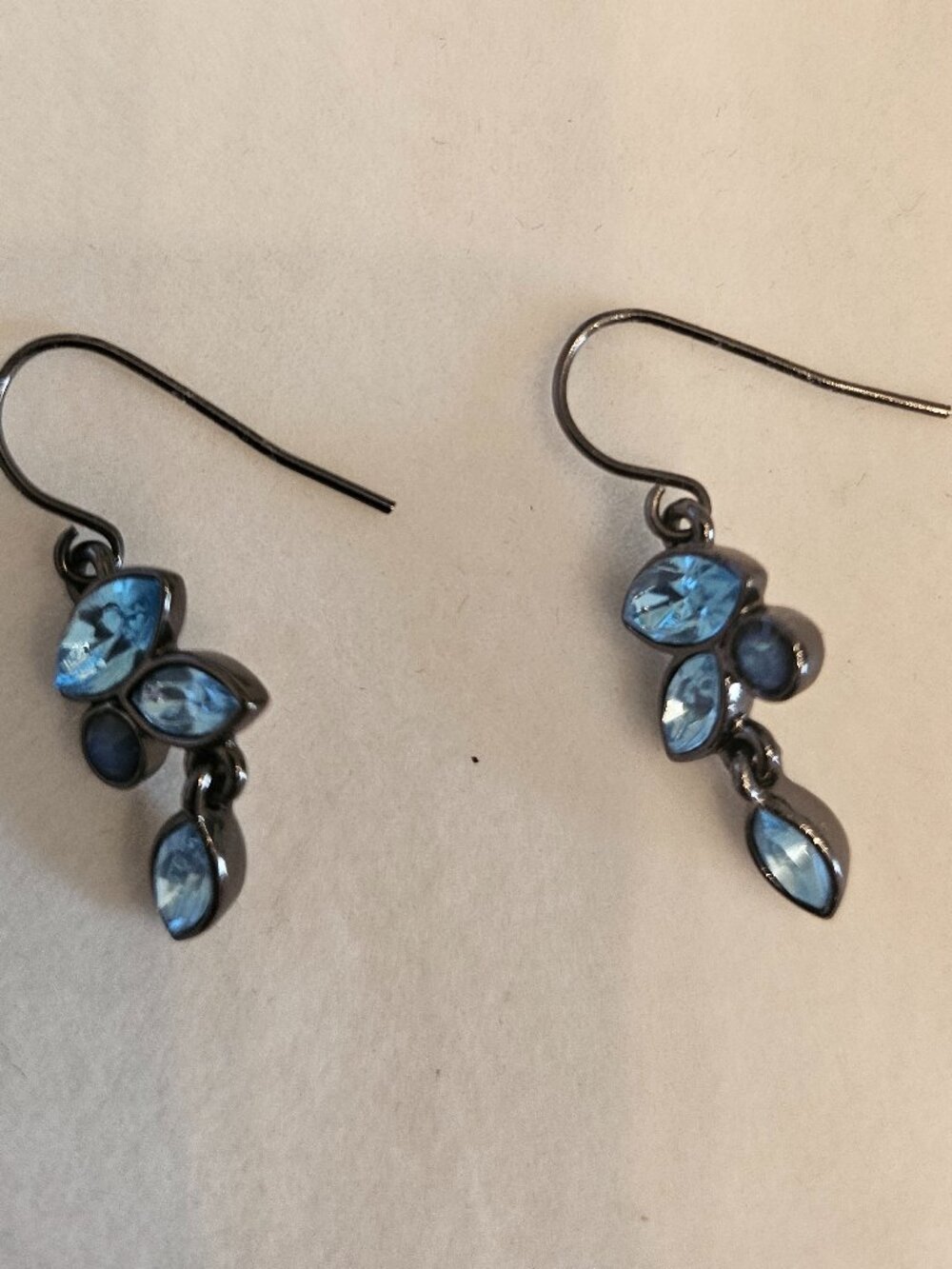 Topaz dangly earrings set in silver plating